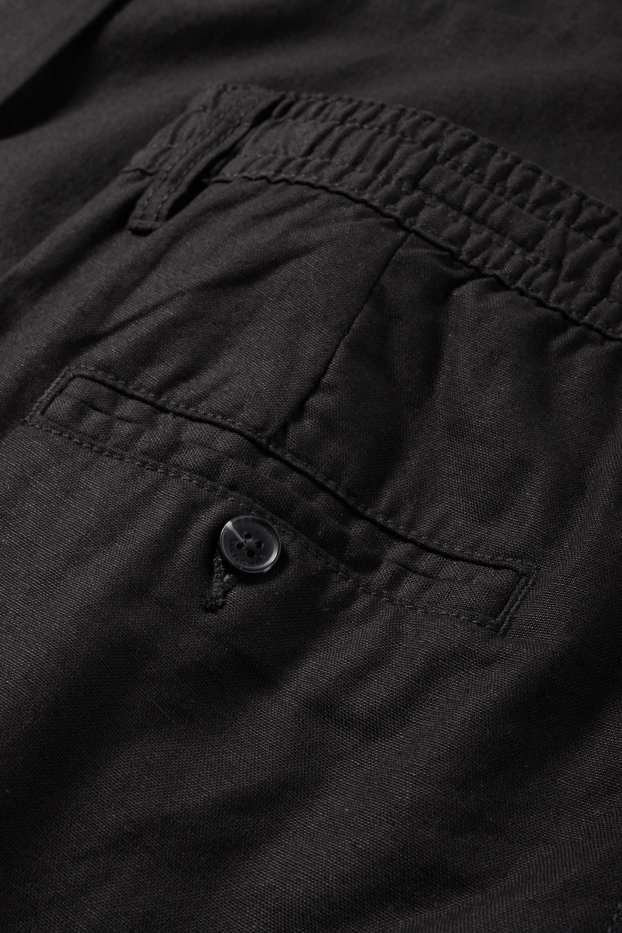 Uomo - Pantaloni cargo - tapered fit - nero