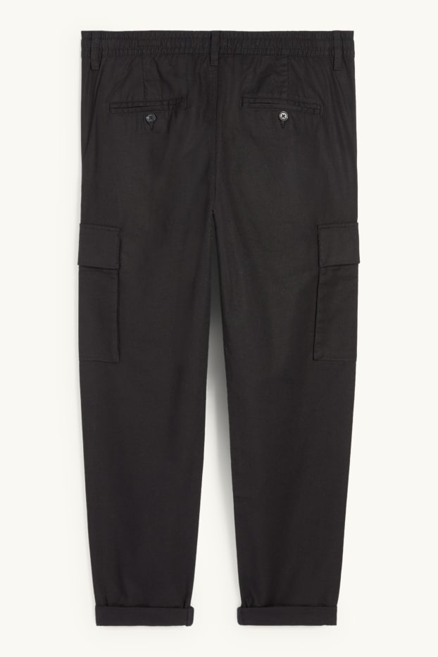 Uomo - Pantaloni cargo - tapered fit - nero