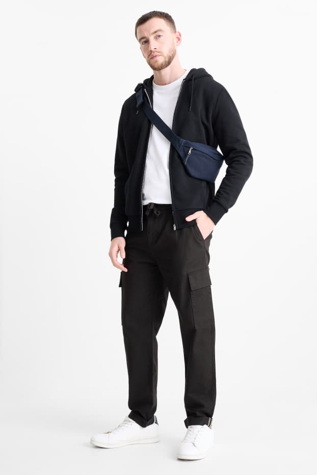 Uomo - Pantaloni cargo - tapered fit - nero
