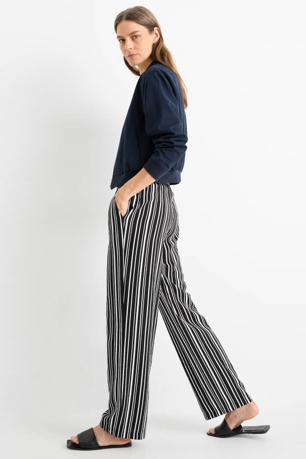 Women - Cloth trousers - high waist - wide leg - striped - black / white
