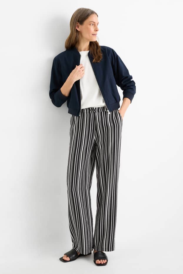 Women - Cloth trousers - high waist - wide leg - striped - black / white