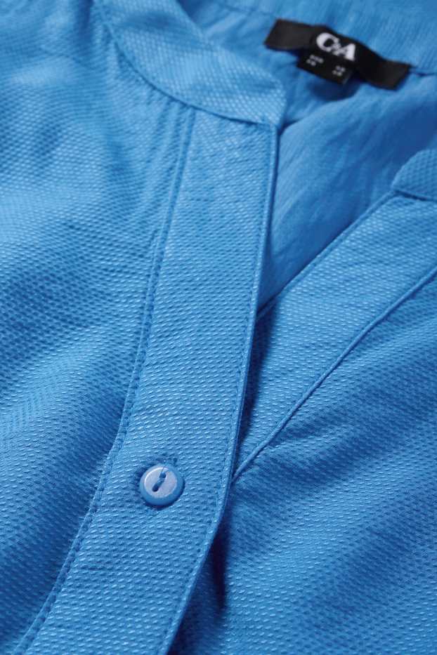 Dona - Brusa amb coll en punta - texturada - blau