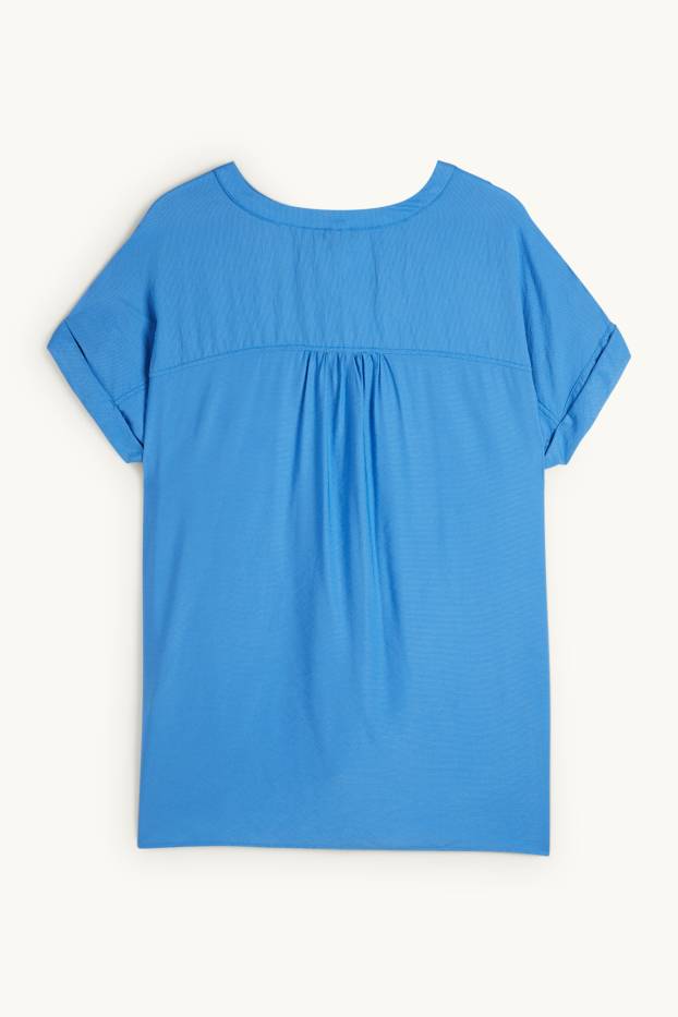 Dona - Brusa amb coll en punta - texturada - blau
