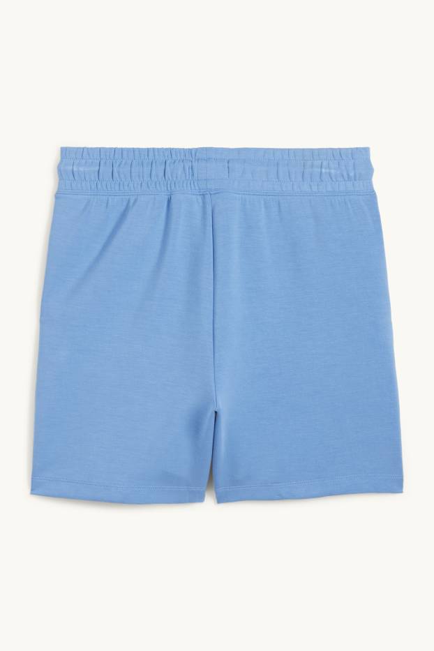 Dona - Pantalons curts tècnics - blau clar