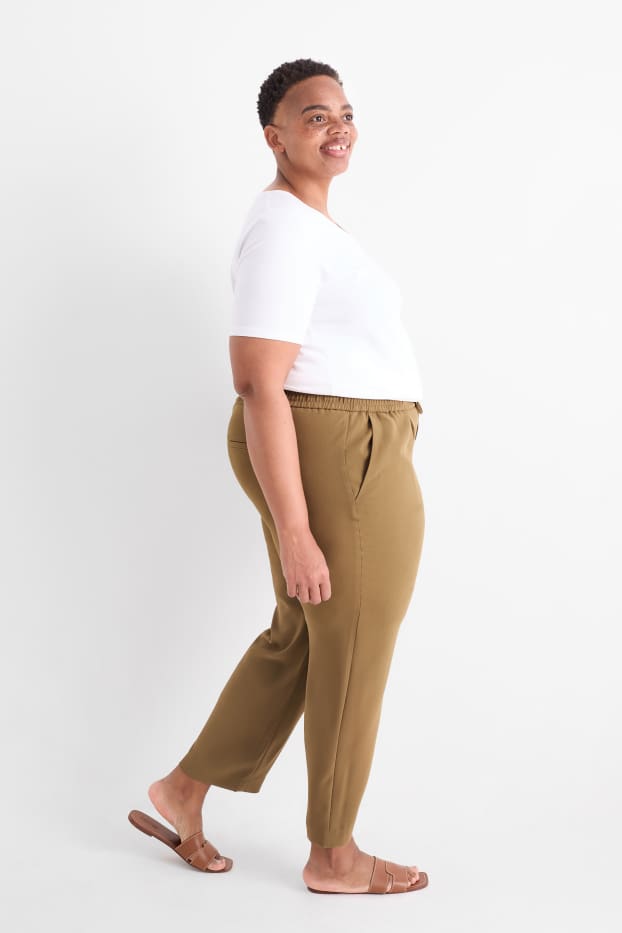 Dona - Pantalons de tela - mid waist - tapered fit - caqui
