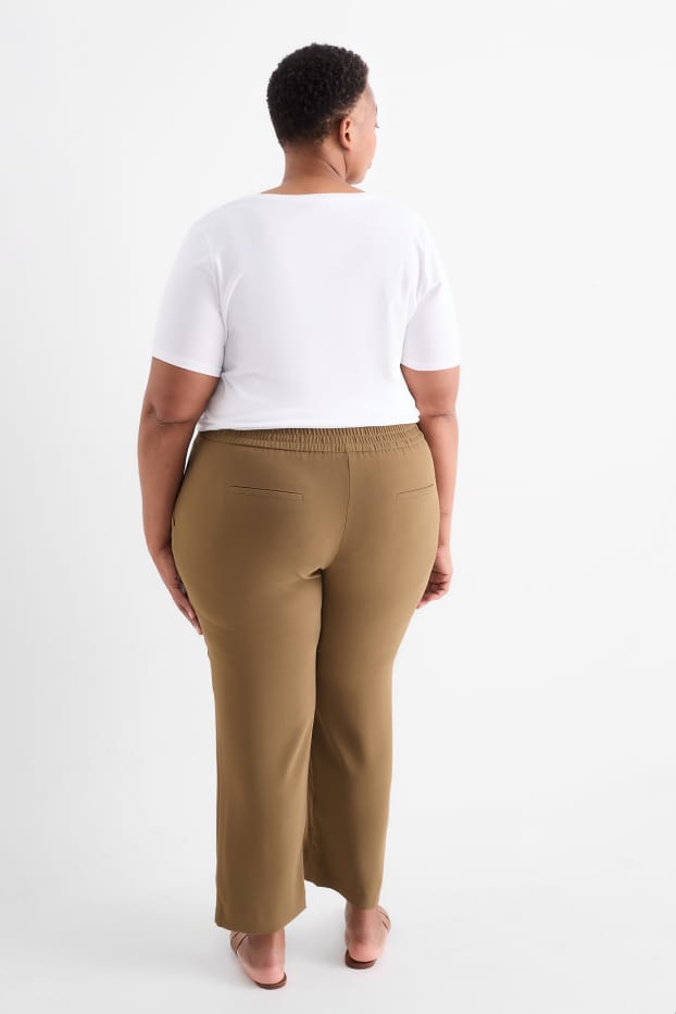 Dona - Pantalons de tela - mid waist - tapered fit - caqui