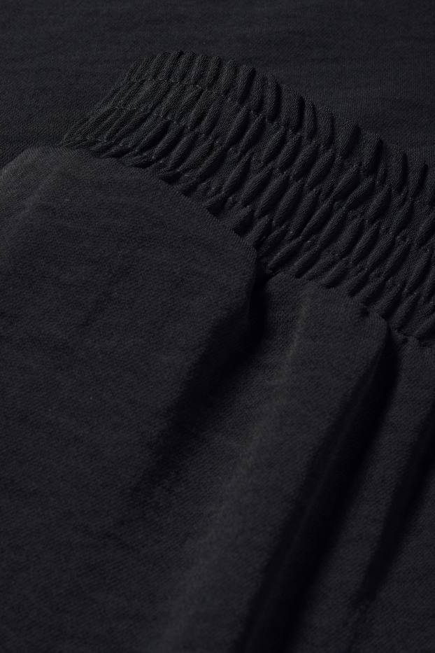 Women - Cloth trousers - high waist - wide leg - black