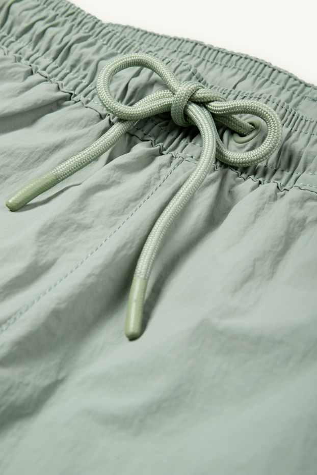 Men - Swim shorts - light green