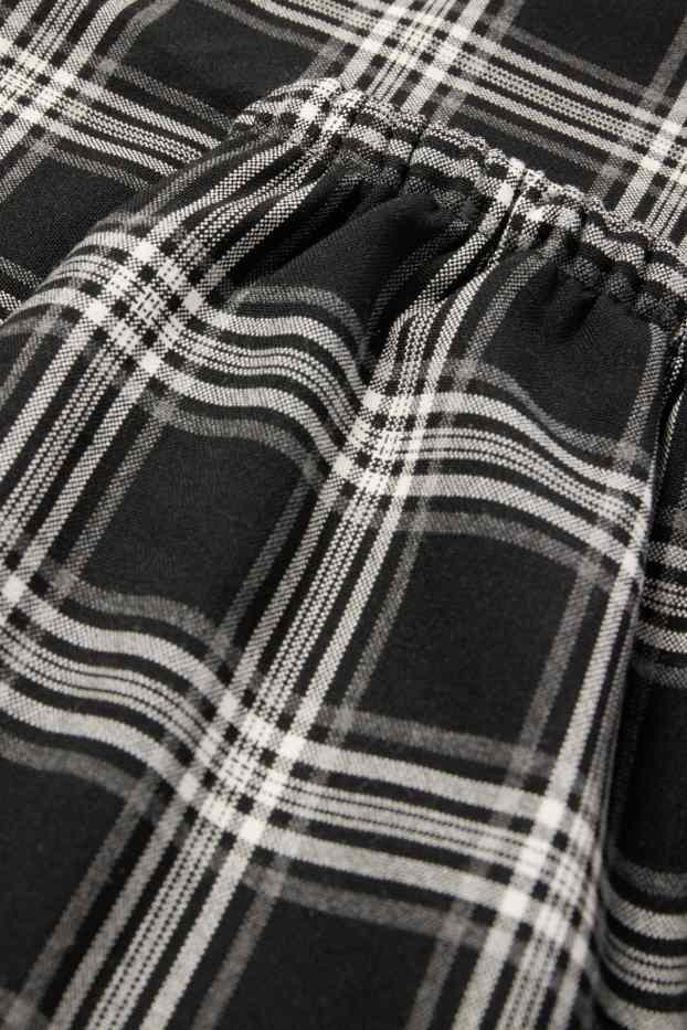 Kinder Mädchen - Stoffhose - kariert - schwarz