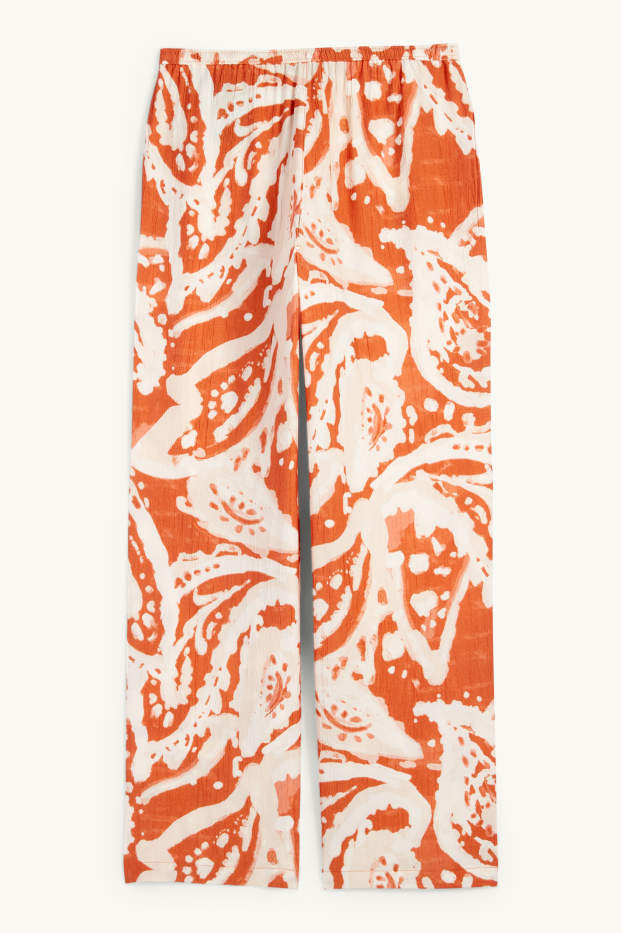 Dona - Pantalons - mid waist - palazzo - estampat - taronja fosc