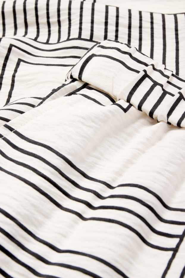 Femmes - Pantalon en toile - high waist - wide leg - à motif - blanc / noir