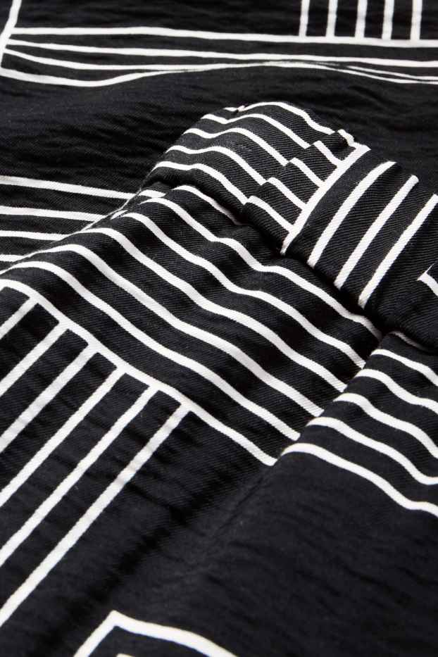 Femmes - Pantalon en toile - high waist - wide leg - à motif - noir / blanc