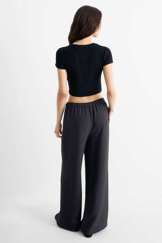 Women - Cloth trousers - mid-rise waist - wide leg - black