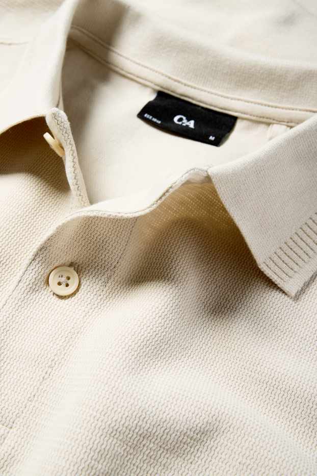 Hommes - Polo en maille - regular fit - finition texturée - beige