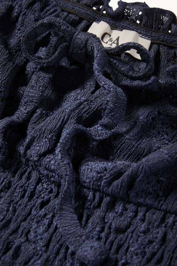 Dames - Korte top - broderie Anglaise - gesmokt - donkerblauw