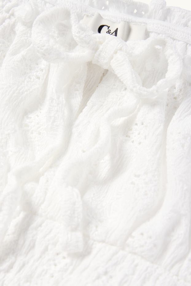 Dames - Korte top - broderie Anglaise - gesmokt - wit