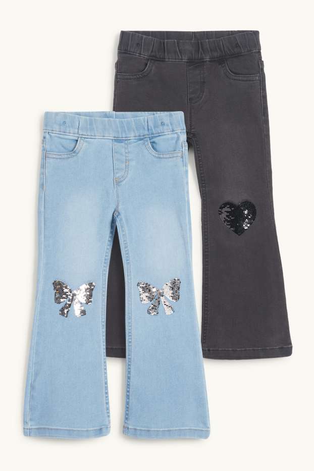 Kinderen: meisjes - Set van 2 - hart en strik - flared jeans - zwart