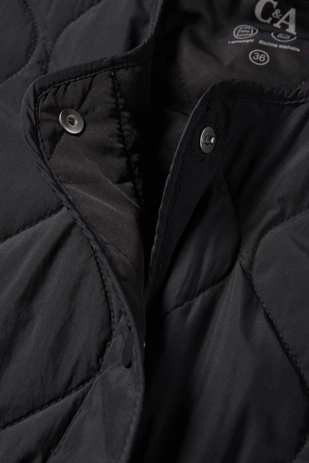 Women - Quilted gilet - black