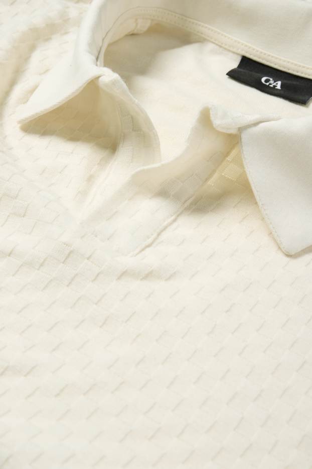 Hommes - Polo - regular fit - finition texturée - blanc crème