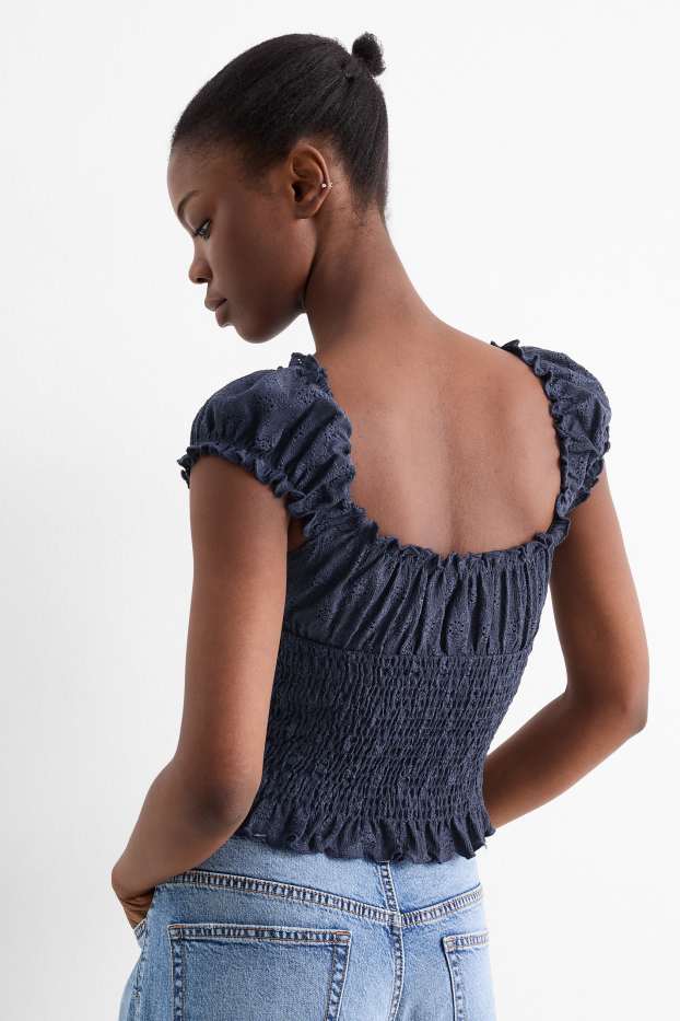 Dames - Korte top - broderie Anglaise - gesmokt - donkerblauw