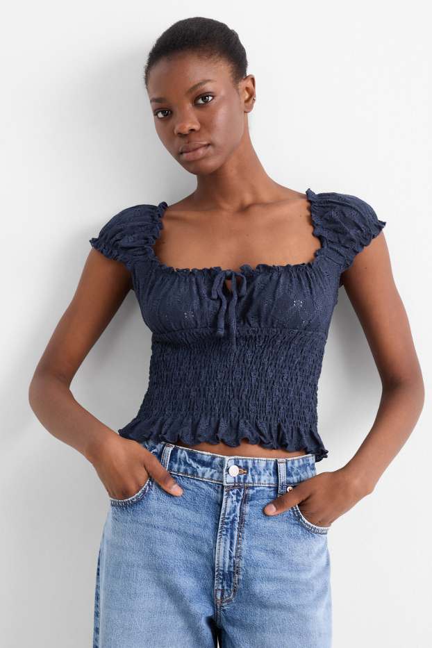 Dames - Korte top - broderie Anglaise - gesmokt - donkerblauw