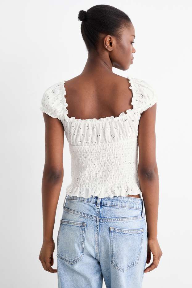 Dames - Korte top - broderie Anglaise - gesmokt - wit