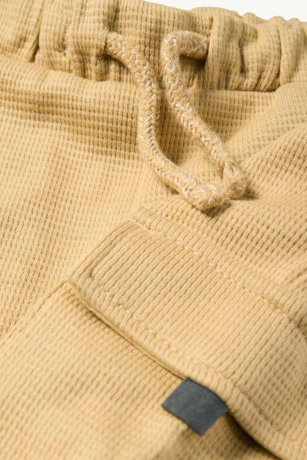 Nadó nen - Pantalons de xandall cargo per a nadó - texturats - groc
