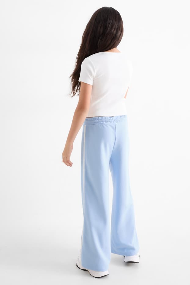 Nena - Cinnamoroll - conjunt - samarreta de màniga curta i pantalons de xandall - 2 peces - blanc / blau clar