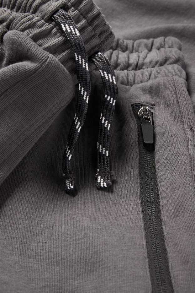 Nen - Pantalons de xandall cargo - gris fosc