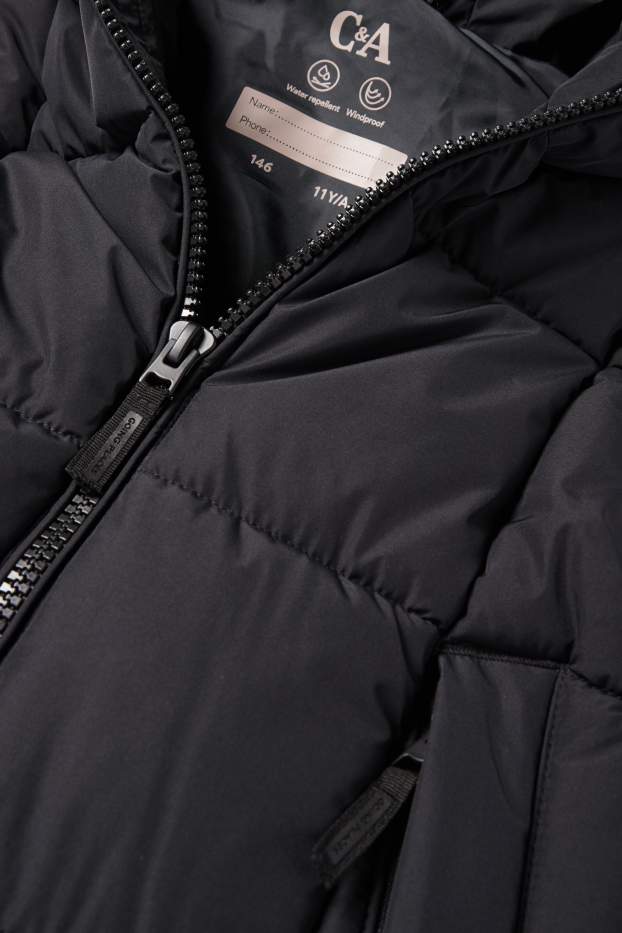 Nena - Armilla embuatada llarga amb caputxa - repel·lent a l’aigua - negre