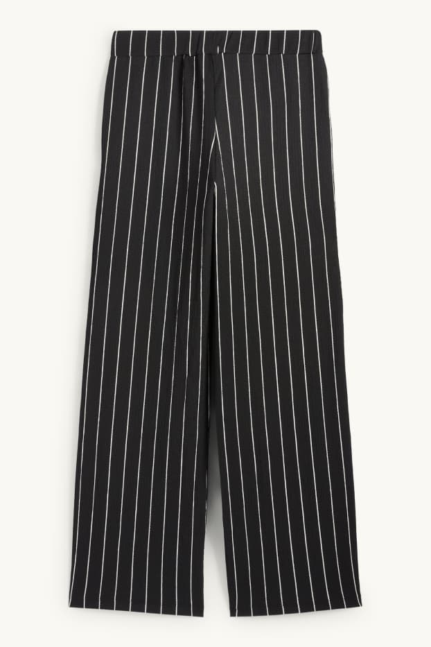 Dames - Broek van jersey - mid waist - loose fit - gestreept - zwart / wit