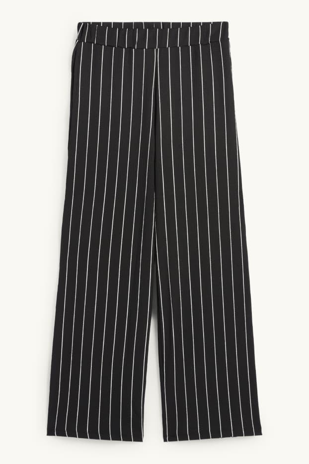 Dames - Broek van jersey - mid waist - loose fit - gestreept - zwart / wit
