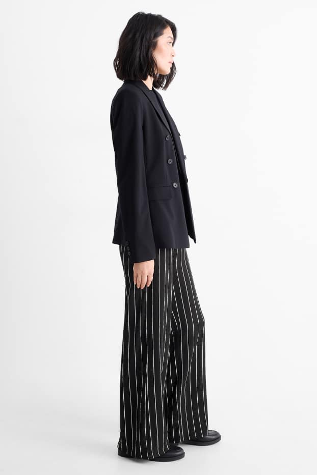 Dames - Broek van jersey - mid waist - loose fit - gestreept - zwart / wit