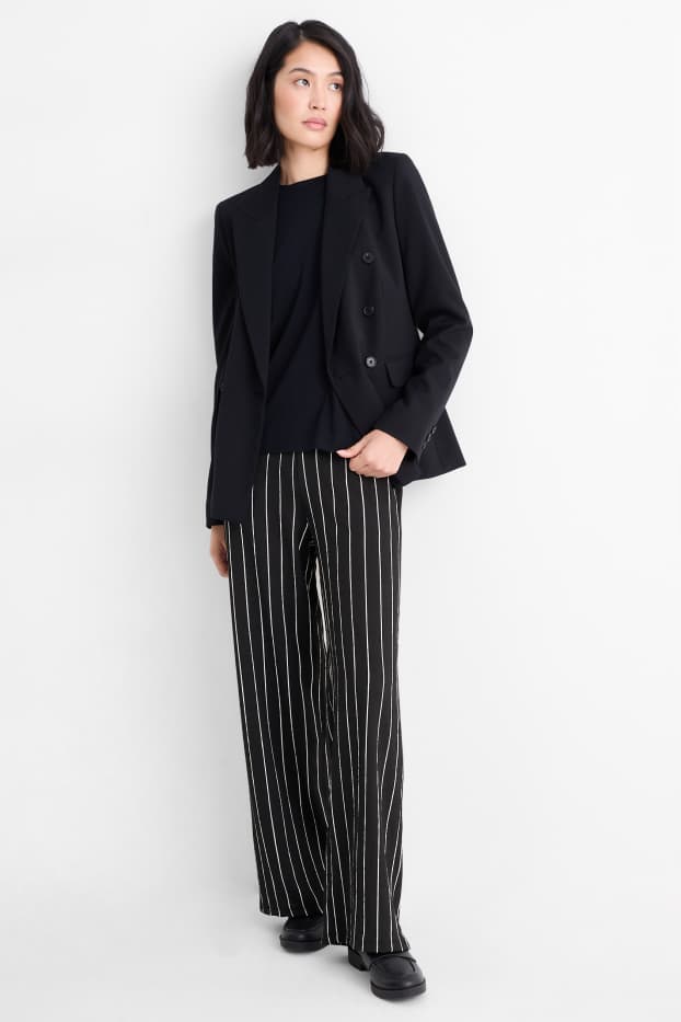 Dames - Broek van jersey - mid waist - loose fit - gestreept - zwart / wit