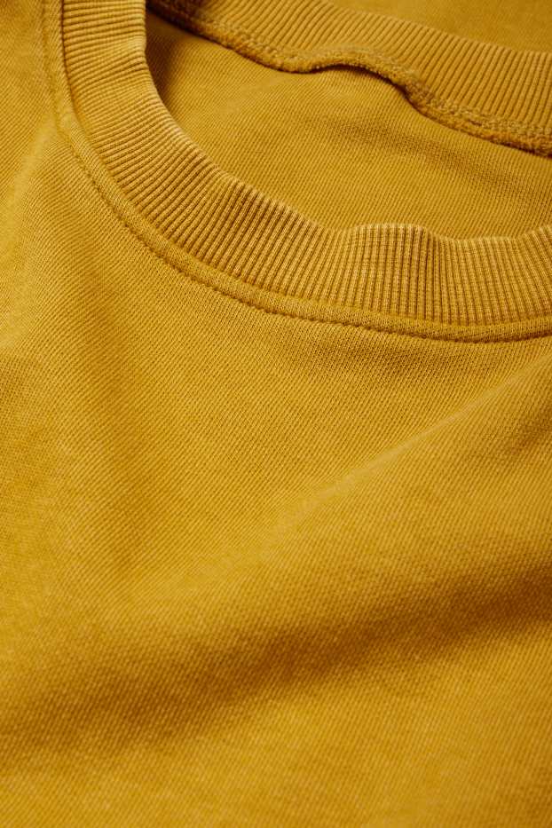 Dames - T-shirt-jurk - mosterdgeel