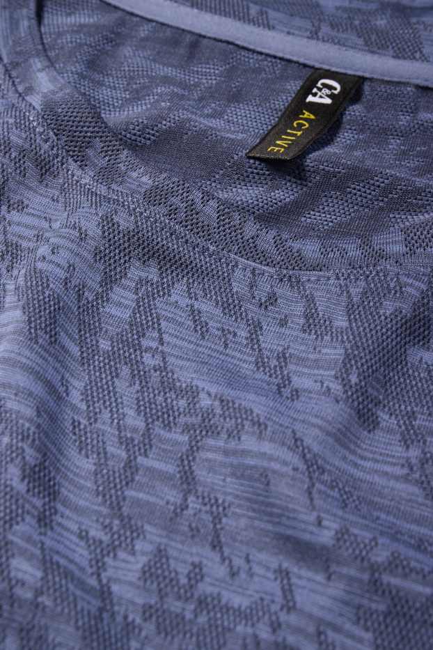 Femmes - Haut de sport - finition texturée - bleu foncé