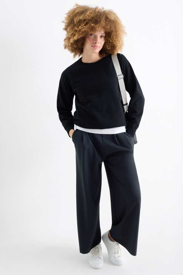 Femmes - Pantalon en jersey - mid waist - palazzo - noir