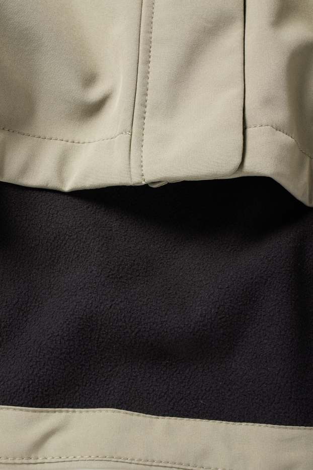 Donna - Giacca soft shell con cappuccio - idrorepellente - 4 Way Stretch - verde chiaro