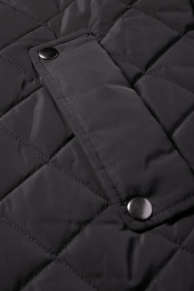 Dona - Abric embuatat - negre