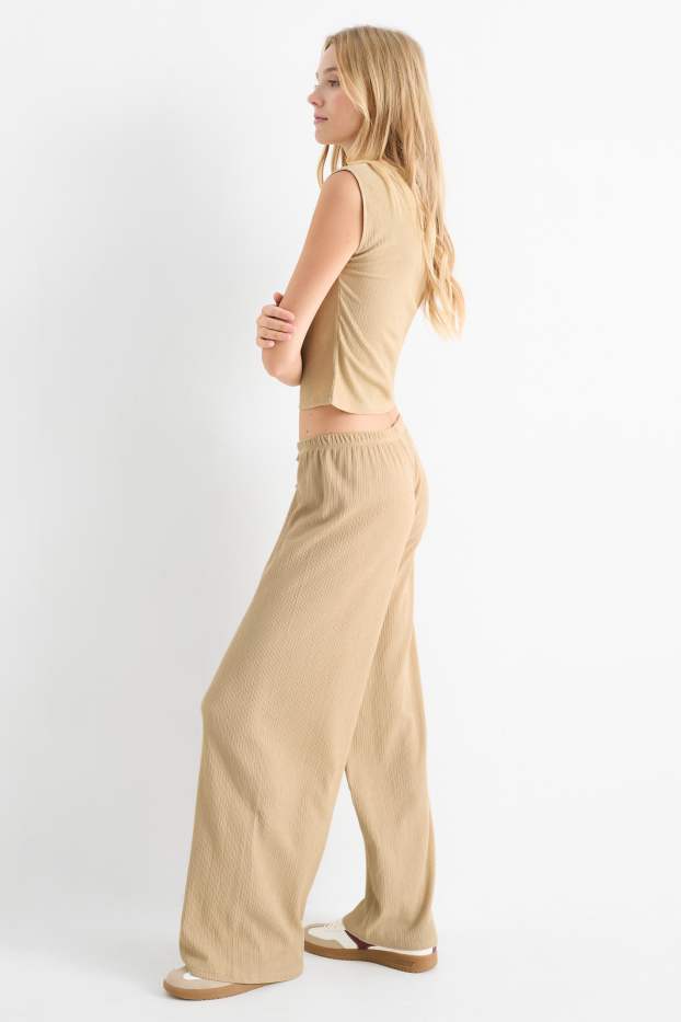 Femmes - Pantalon en jersey - mid waist - wide leg - finition texturée - beige
