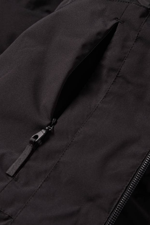 Men - Quilted gilet - water-repellent - black