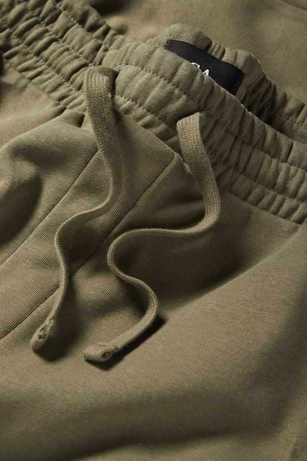 Uomo - Pantaloni sportivi - verde