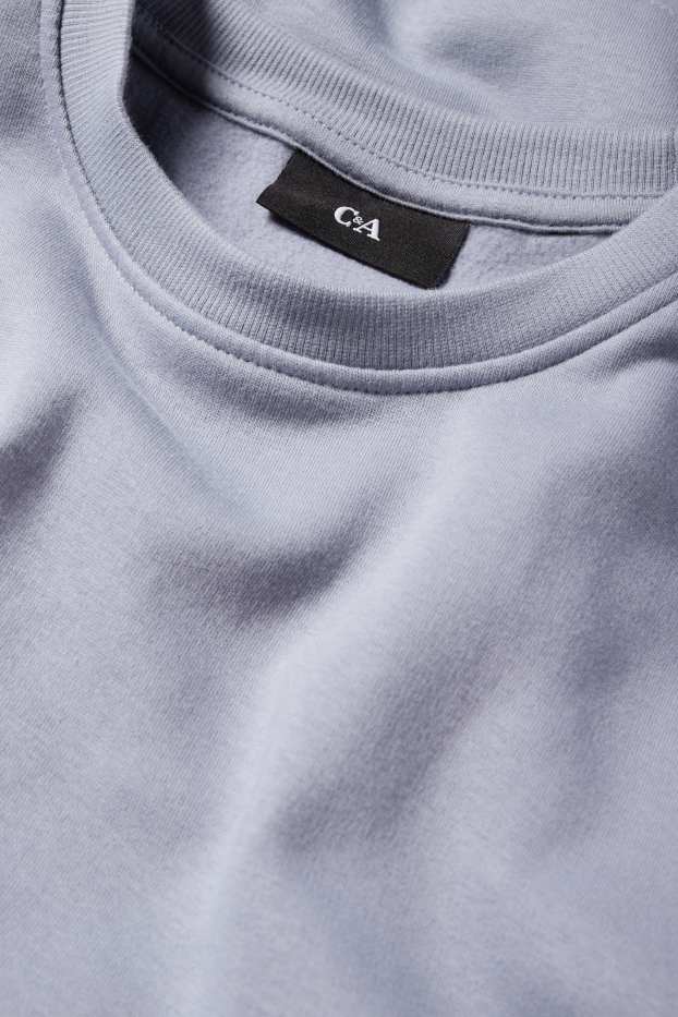 Home - Dessuadora - blau clar