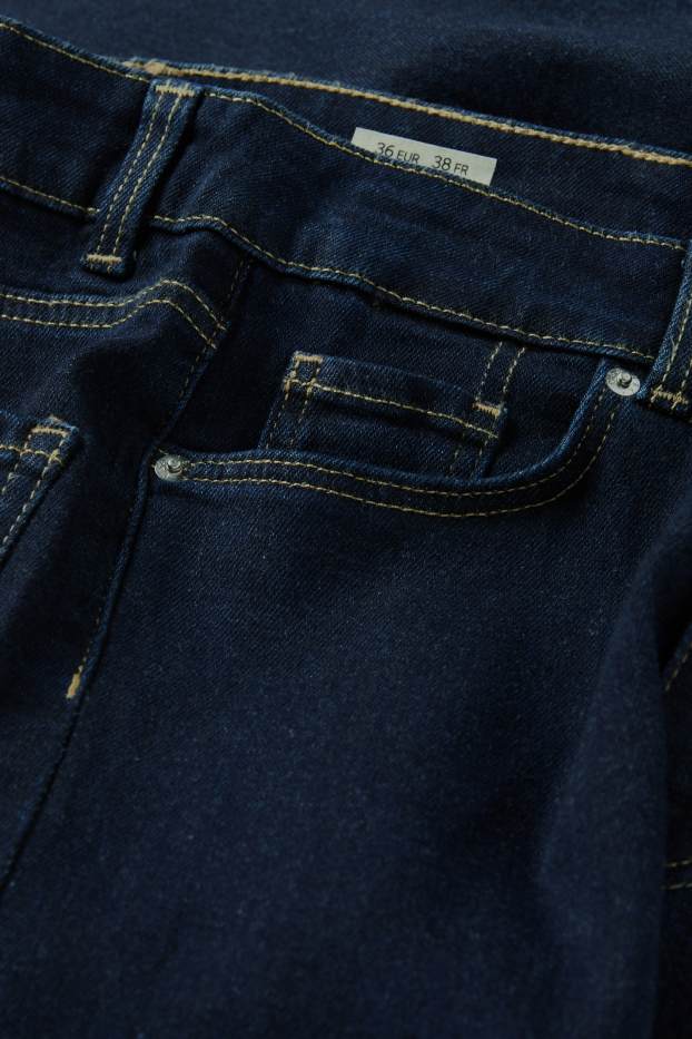 Femmes - Jean à jambe évasée - mid waist - jean bleu foncé