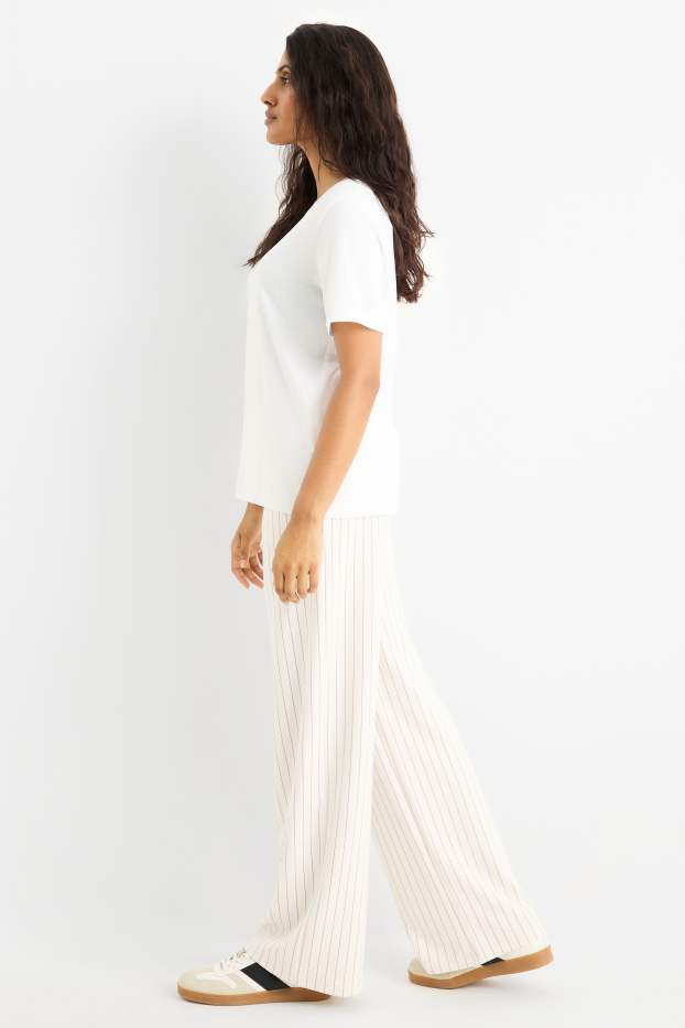 Dames - Broek van jersey - mid waist - straight fit - met strepen - crème wit
