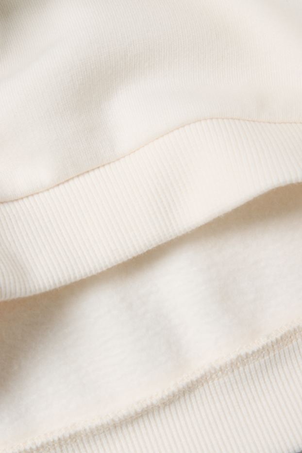 Kinderen: meisjes - Bloem - set - sweatshirt en jersey broek - 2-delig - crème wit