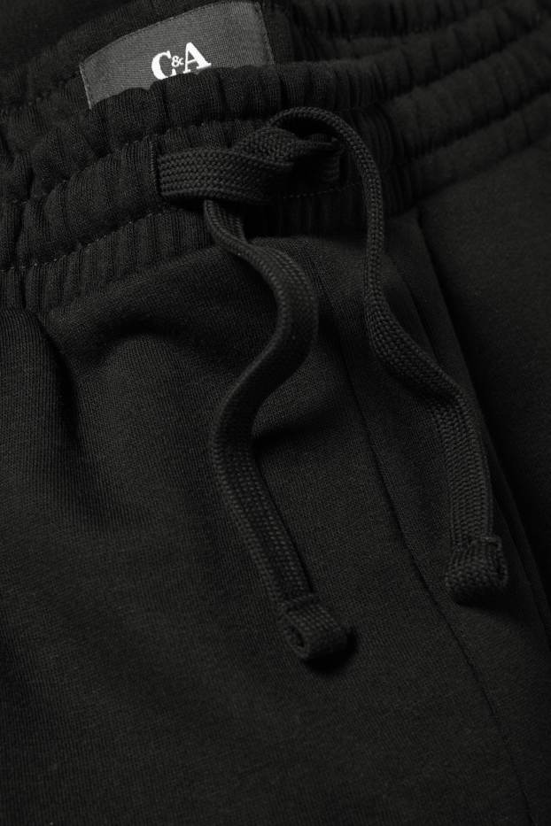 Pánské - Teplákové kalhoty - černá