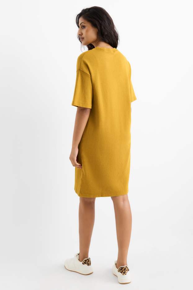 Dames - T-shirt-jurk - mosterdgeel