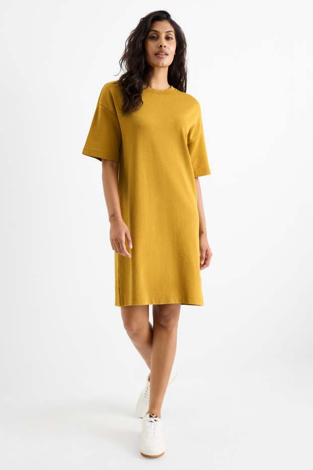 Dames - T-shirt-jurk - mosterdgeel