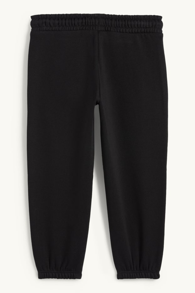 Kinderen: jongens - Halloween - skelet - joggingbroek - glow in the dark - zwart